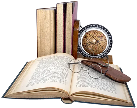 An open book with glasses resting on it, alongside a compass, symbolizing exploration and knowledge.